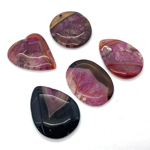 Polished natural agate stone pendant set with striped heart, round and teardrop shapes