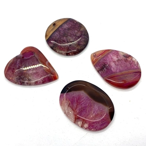 Polished striped agate pendants in purple and pink heart, oval, and drop shapes