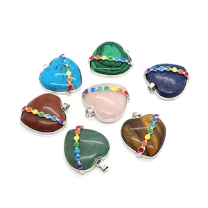 Heart-shaped natural stone pendants with rainbow chakra metal inlay and silver frames