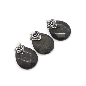 Three teardrop black agate pendants with evil eye bead and rhinestone silver bail