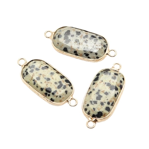 Oval Dalmatian Jasper faceted stone connectors with gold edges for jewelry making