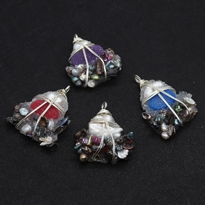 Detailed handmade wire-wrapped pendants with natural freshwater pearls and colorful crystals