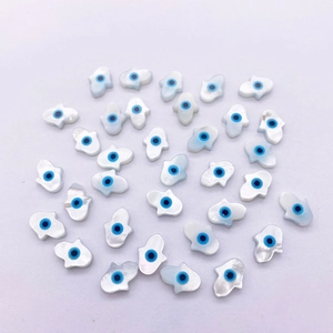 Amuletos de mano de Hamsa de concha natural con diseño de ojo para joyería DIY