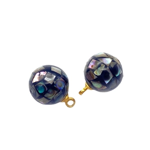 Pair of spherical mosaic pendants with natural shell inlays and golden connector rings