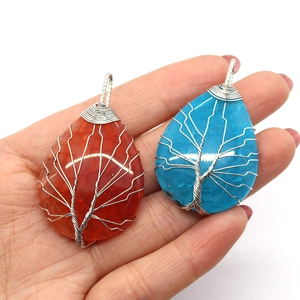 Handmade wire wrapped tree of life teardrop agate pendants in blue and red stones