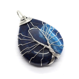 Water drop blue agate pendant with silver wire wrapped Tree of Life design on white background