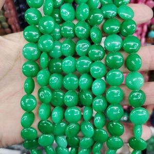 Close-up of green natural stone rondelle beads 12x6mm for DIY jewelry making