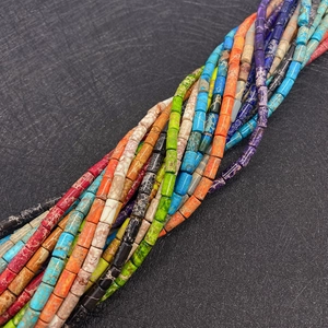 Detailed close-up of colorful 4x8mm imperial stone cylinder beads for DIY jewelry making