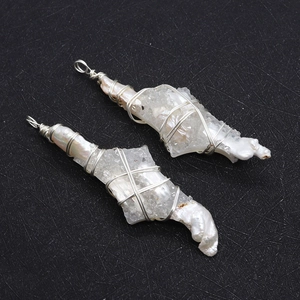 Detailed wire-wrapped baroque pearl and translucent raw crystal pendant accessories