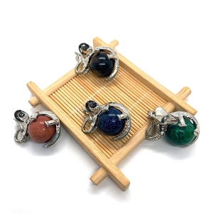 Elephant gemstone pendants with malachite, blue sandstone, and tiger eye stone