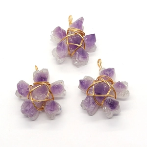 Natural purple amethyst flower pendant with gold wire wrap and crystal cluster petals