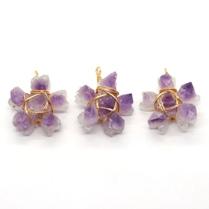 Star-shaped natural amethyst pendants with golden handmade wire wrapping for jewelry DIY