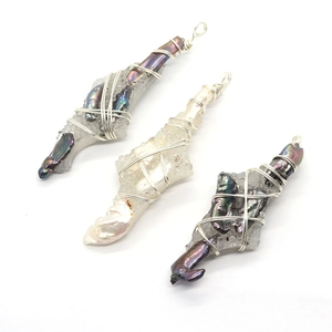 Handmade wire wrapped baroque pearl and crystal pendant with silver metal detailing