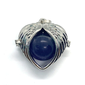 Silver hollow heart angel wings pendant with purple crystal stone sphere core