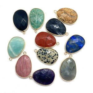 Set of 11 faceted natural stone teardrop pendants with metal edging and top rings