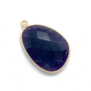 Faceted natural stone teardrop pendant in deep purple with elegant gold metal edging