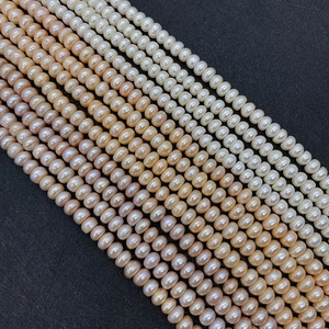 Detail of Grade AA natural freshwater pearls in white and pink for jewelry DIY crafting