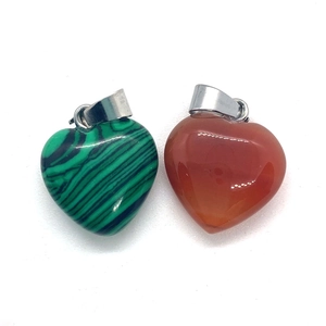 Natural heart stone pendant set featuring malachite and carnelian with silver metal clips