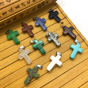 Natural gemstone cross pendants in various stones like turquoise and malachite with silver bails