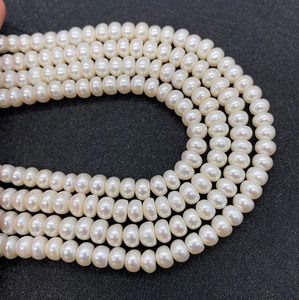 Strands of high-quality white freshwater pearls with bright luster for jewelry making