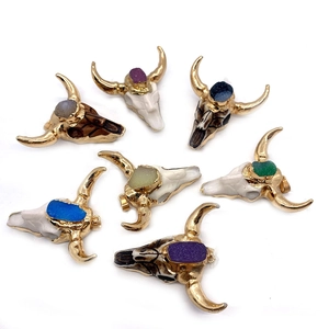 Set of seven acrylic bull skull pendants with colorful druzy stones and golden horns