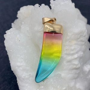 Rainbow gradient natural stone pendant with gold clasp and bohemian horn shape design