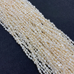 Macro shot of 7-8mm white natural freshwater pearls with high luster and smooth texture