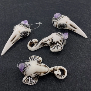 Ethnic style bird skull and elephant pendant with purple gemstone and rhinestones