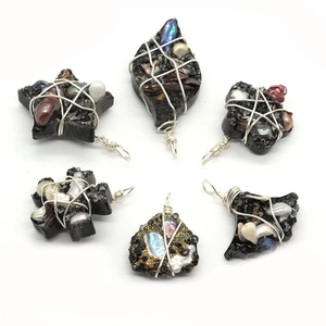 Handmade black resin pendants set with silver wire wrap and colorful baroque pearls