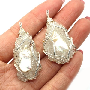 Handmade wire wrapped pendant with natural baroque pearl and white crystals on silver