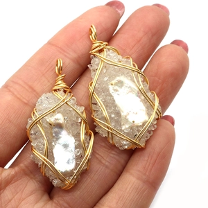 Handmade wire wrapped natural freshwater pearl and resin pendant with gold wire details