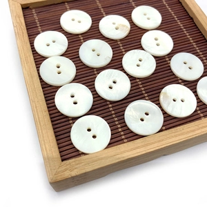 Natural white shell buttons in flower shape for DIY jewelry with pearl luster finish