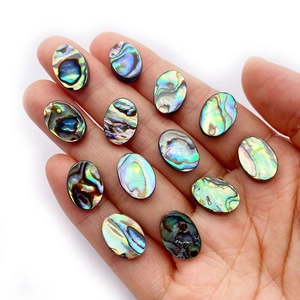 Natural abalone shell oval beads set of 13 showing rainbow luster for DIY jewelry