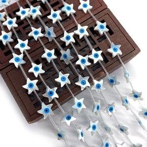 Cuentas de concha natural en forma de estrella con patrón de ojo azul para joyería DIY