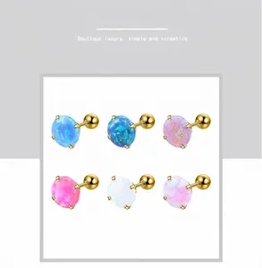 Ensemble détaillé de six paires de boucles d'oreilles opale ronde en couleurs avec griffes d'or