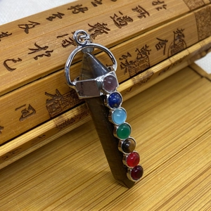 Tiger eye crystal hexagonal pendant with seven chakra stones on bamboo scrolls