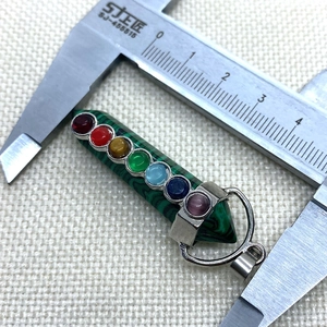 Detailed measurement showing 38mm length of a malachite hexagonal chakra stone pendant