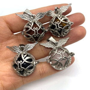 Natural tiger eye stone and crystal ball pendants with silver hollow wing design