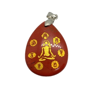 Red jasper teardrop pendant with golden yoga meditation symbols and silver clasp