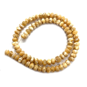 Goldene natürliche Muschelperlen in Spiralform für die Herstellung von Halsketten