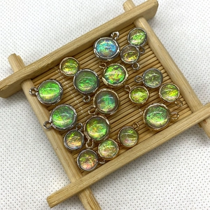 Iridescent natural stone round pendants in gold and silver frames for DIY jewelry