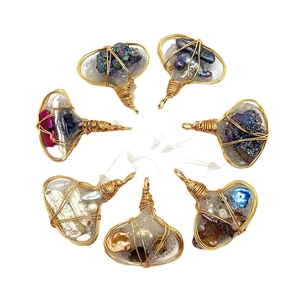 Handmade wire wrapped natural stone pendants in irregular shapes with gold metal wire decor