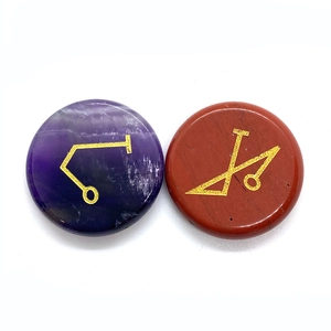 Natural amethyst and red jasper stones with gold engraved reiki symbols and motifs