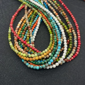 Macro shot of 4-6mm round imperial turquoise stone beads for DIY jewelry making