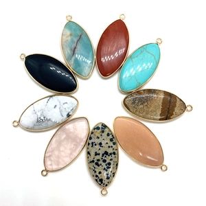 Set of nine marquise-shaped natural stone pendants with elegant gold-plated edges
