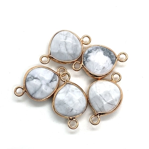 Five teardrop-shaped white marble stones with rose gold edges for DIY necklace jewelry