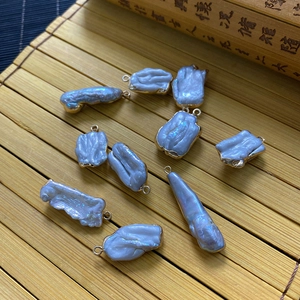 Irregular grey-blue baroque pearl pendants with gold-plated metal base for jewelry making