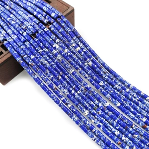 Macro detail of blue mottled cylindrical gemstone beads for DIY jewelry making