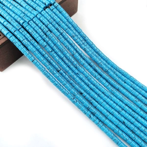 Macro detail of blue turquoise tube beads with black veins for DIY jewelry making