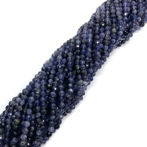 Macro shot of 6mm faceted natural iolite stone beads for DIY jewelry making